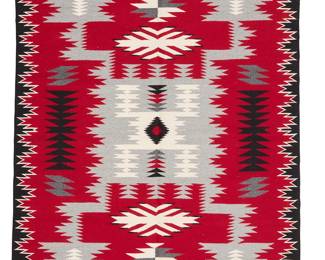 3265
A Sharron Bahe Navajo Ganado rug
Sharron Bahe (b. 20th century, Diné)
Late 20th/21st century
Woven in red, grey, white, and black wool in a stylized storm pattern with lightning and water bug motifs, and an elaborate sawtooth border
54" H x 39" W
Estimate: $600 - $900