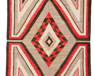 3220
A Navajo regional rug
Early 20th century, Diné
With a central concentric checkered and stepped diamond and floating triangles, woven in red, natural grey, cream, and dark brown wool
71" H x 46.5" W
Estimate: $700 - $900