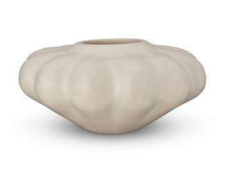 3317
Andrew Padilla (1956-2021, Santa Clara/Laguna Pueblo)
A whiteware "melon" jar, early 21st century
Signed and inscribed in slip to underside: Andrew Padilla / Laguna / N.M.
The stone-polished low jar with lobed shoulder
4.625" H x 9.5" Dia.
Estimate: $200 - $400