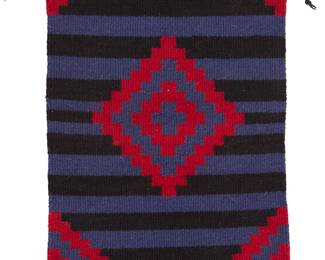 3259
A Susan Burbank Navajo regional weaving
Susan Burbank (b. 20th century, Diné)
Late 20th/21st century
Woven in red, dark blue and black wool in a traditional wearing blanket motif with striped banding and a central stepped diamond
22" H x 14.75" W
Estimate: $200 - $400