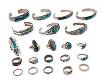3399
A group of Southwest silver and turquoise jewelry
Mid/late 20th century
Five variously marked for maker or shop: S [with moon] / Fr / Maisel's / Sanford; two marked for sterling
Comprising seven small silver cuffs, from single to triple-wire, three with row-set needlepoint turquoise, two with row-set petit point turquoise, and two with single set stones, as well as fifteen silver and stone set rings in various styles, including one ring with a Yei dancer design in chipped turquoise and coral mosaic inlay, most with set stones including turquoise, coral and shell
22 pieces
Largest cuff: 6.5" total inner C; Smallest: 6" total inner C; Ring sizes: 6.5 to 4.5
219.4 grams gross
Estimate: $700 - $900