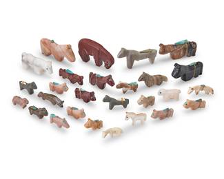 3411
A group of Southwest Pueblo carved stone horse fetish figures
Mid/late 20th century, mostly Zuni Pueblo
Four labeled for artist
A group of carved stone figures, primarily horses, in various sizes and various stones and materials
including pipestone, shell, bone, and other pink, grey, and white hardstones, including four figures by Zuni artist Emery Boone, as well as twenty-three further figures including a ram, most with mounted offerings
27 pieces
Largest: 1.625" H x 0.5" W x 2.75" D; Smallest: 0.625" H x 0.25" W x 1" D
Estimate: $200 - $400