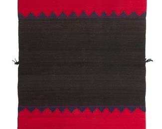 3204
A Navajo traditional dress
Mid-20th century, Diné
A full dress comprising two woven panels in black, red and blue wool featuring banded ends with stepped triangle and striped motifs, the panels attached at various points at top and sides
Each panel 47" H x 30" W approximately
Estimate: $800 - $1,200