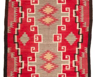 3261
A Navajo Ganado rug
Earl/mid-20th century, Diné
With elaborate hooked diamonds, floating serrated diamonds and a latticed long edge border, woven in red, dark brown, cream, natural grey, and ochre wool
80.5" H x 47.25" W
Estimate: $1,500 - $2,500