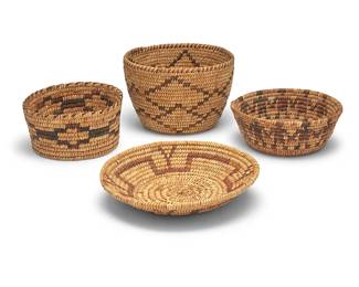 3295
A group of Papago baskets
Early/mid-20th century, Tohono O'odham; Southwestern United States
Four coiled baskets comprising a tall basket with interlocking diamonds and rim ticking (4.75" H x 7" Dia.), a smaller basket with a band of figures holding hands (2.5" H x 6.75" Dia.), a basket with a band of stepped diamonds (3" H x 6" Dia.), and a basketry tray with a central stepped cross motif with Y shapes to sides (1.5" H x 8.25" Dia.)
4 pieces
Estimate: $200 - $400