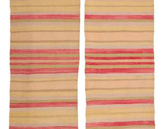 3190
A pair of Rio Grande textiles
Early/mid-20th century; New Mexico
Two matching loom-width pieces woven in lilac, red, green, yellow and grey wool in a banded motif
87" & 84" H x 23" W approximately
Estimate: $200 - $300