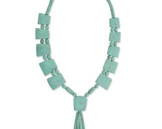 3384
A Southwest Pueblo-style carved turquoise necklace
Mid/late 20th century
A strand of turquoise beads with chunky graduated tabs and a central stone pendant suspending two bead jaclas
31" L x 5.75" H
245.8 grams gross
Estimate: $500 - $700