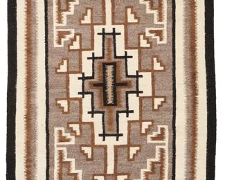 3234
A Navajo Two Grey Hills rug
Mid/late 20th century, Diné
Woven in grey, black, cream, brown, and light brown wool with a large central stepped diamond with triangle ends and multiple banded borders
48" H x 36" W
Estimate: $200 - $400