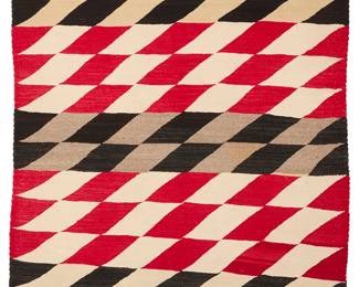 3224
A Navajo regional rug
Mid-20th century, Diné
Woven red, black, grey, white and ochre wool in an optical checkered pattern of banded diamonds
63" H x 44" W
Estimate: $500 - $700
