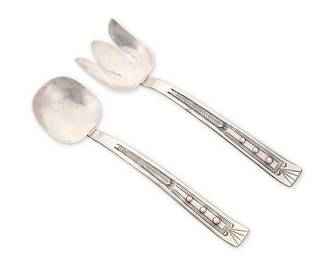 3098
A Santa Fe sterling silver salad serving set
Mid-20th century
Each unmarked, XRF tested for sterling
2 pieces
Each: 11" L
Total weight: 8.5 oz. troy approximately
Estimate: $600 - $800