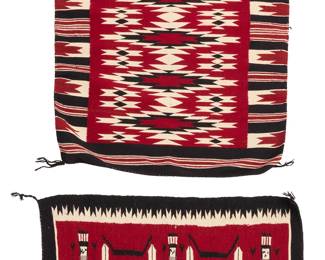 3270
Two Navajo Ganado textiles
Mid/late 20th century, Diné
Comprising a small rug woven in red, black, and cream wool with conjoined stacked serrated diamonds and an elaborate border to two sides with striped banding to ends, as well as a small pictorial Yei weaving woven in red, cream, grey, and ochre wool depicting three Yei figures with feathers and floating mask motifs, with an elaborate sawtooth border to two sides
2 pieces
Larger: 37.25" H x 27" W; Smaller: 21.75" H x 30" W
Estimate: $300 - $500