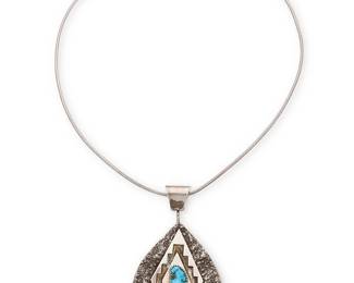 3385
A Tony Aguilar Sr. Kewa sterling silver and turquoise pendant necklace
Tony Aguilar, Sr. (1919-2002, Kewa/Santo Domingo Pueblo)
Late 20th century
Stamped to one side: A [with half circle above] / Sterling
Comprising a double-sided pendant, one side with a silver overlay storyteller weaver motif with turquoise mosaic inlay, and with a cast silver and stepped diamond silver overlay motif with a single set turquoise, suspended from an associated chain
2 pieces
16.26" L x 3" H x 1.75" W
40.9 grams gross
Estimate: $200 - $400