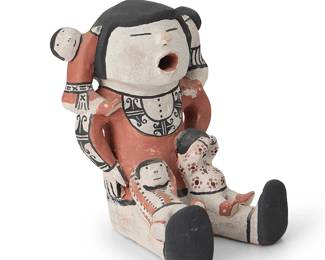 3412
Buffy Cordero Suina (b. 1969, Cochiti Pueblo)
A Cochiti Pueblo polychrome pottery storyteller, late 20th/21st century
Signed to base: Buffy Cordero Suina
With black and white geometric accents, and four children with colorful clothing
6.5" H x 5" W x 5.25" D
Estimate: $200 - $400