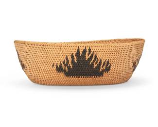 3289
A polychrome Washoe basketry bowl
Early/mid-20th century; Northern California/Nevada
A coiled oval low bowl with four irregular sawtooth or flame motifs in black and in brown.
2.75" H x 8.75" W x 7" D
Estimate: $200 - $400
