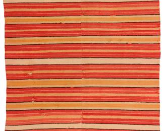 3189
A Rio Grande blanket
Early 20th century; New Mexico
Comprising two joined loom-widths woven in red, orange, pink, and brown wool in variable striped bands
75.5" H x 50" W
Estimate: $300 - $500