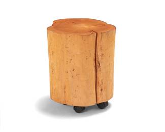 3169
A tree stump stool
Late 20th century
The lacquered live edge wood stump raised on plastic casters
19.125" H x 17" W x 15.5" D
Estimate: $600 - $800
