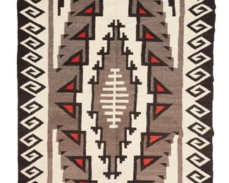 3233
A Marilyn Manhiemes Navajo regional rug
Marilyn Manhiemes (b. 20th century, Diné)
Mid-20th century
With an elaborate central diamond and intricate swirl to long edge border, woven in black, white, grey, and red wool
94.5" H x 50" W
Estimate: $800 - $1,200
