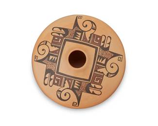 3336
Fawn "Little Fawn" Navasie Garcia (b. 1959 Hopi-Tewa)
A polychrome pottery jar, late 20th/early 21st century
Signed to underside: Fawn / [deer track cipher]
The three-color pot with brown and black waves and whirlwind motifs to shoulder on a cream slip ground
2.75" H x 5.25" W
Estimate: $200 - $400