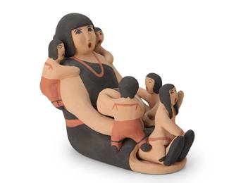 3400
Marie Gachupin Romero (1927-2007, Jemez Pueblo)
A Jemez Pueblo polychrome pottery storyteller figure, mid/late 20th century
Signed to base: Marie G. Romero / Jemez / [corn symbol, for Corn Clan]
A small seated figure wearing a black dress and with five children and an infant in her arms
4.75" H x 3.75" W x 6" D
Estimate: $100 - $200
