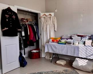 Antique wedding dress, bedding, jackets 
