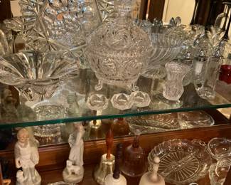 Slat dips, candy dishes, toothpick holder, bells, and figurines.