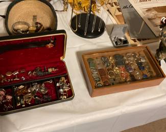 Cufflinks, costume jewelry, watches, binoculars.