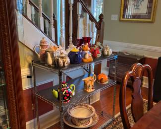 collection of tea pots area rug