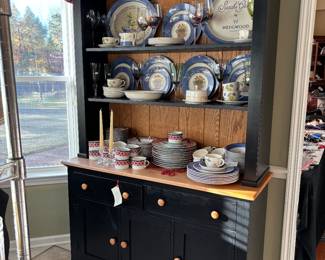 Farmhouse open shelf dining hutch in primitive black cabinet with a light wood countertop. Wedgewood dishes " Sarah 's Garden" window treatment is also for sale