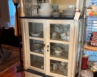 distressed white and black display cabinet or hutch