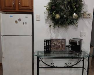 fridge, wreath, glass and iron hall table