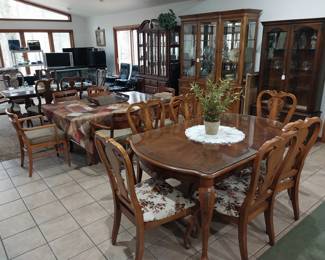 Dining tables and chairs, china cabinets