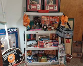 U of M mini backboards, Detroit Bad Boys mini backboard, Budweiser mini shuffleboard table, Michael Jordan figurine, LeBron James Rookie of the Year shadow box, Wheaties boxes, Tony Stewart