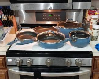 LG propane stove, LG over the oven microwave, Pioneer Woman cookware
