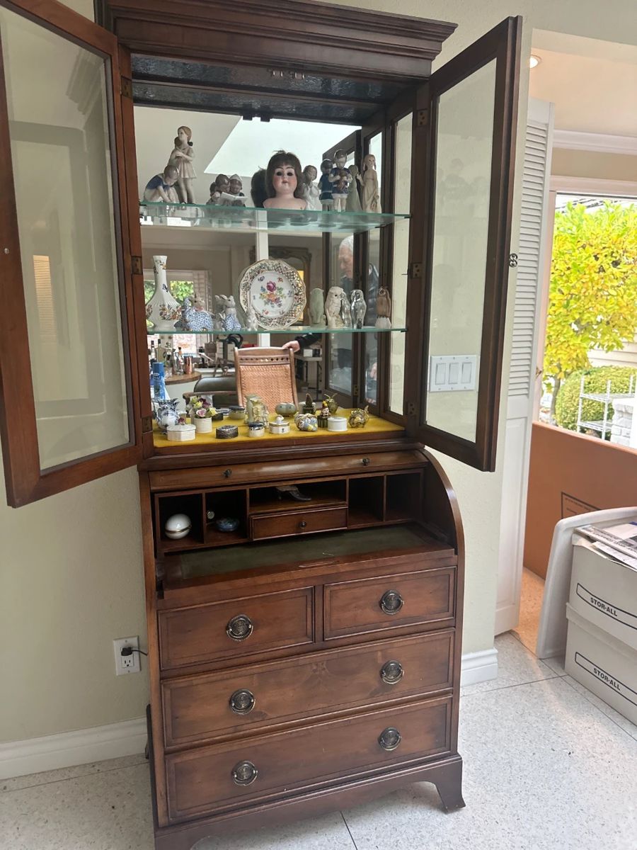 desk with glass front hutch