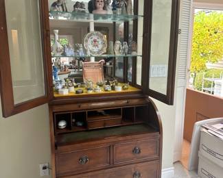 desk with glass front hutch