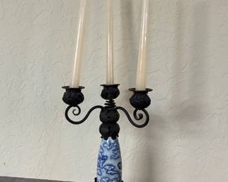 Antique iron and porcelain candlesticks