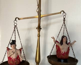 Scale made in Greece, pottery sinners, woman and priest in hellfire figurines, Naples, Italy