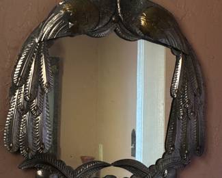 Peacock mirror in the style of Sergio Bustamante