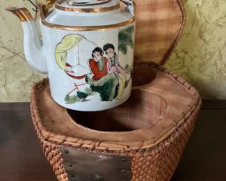 Antique Japanese tea set in basket