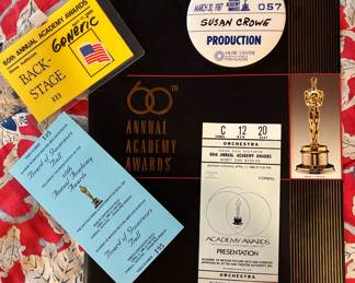 One of these dresses was worn to the 1987 60th Academy Awards backstage party