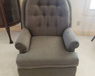 Grey swival chair