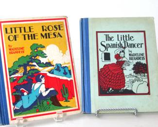 "Little Rose of the Mesa" is a 1935 children's book by Madeline Brandeis about a young girl's adventures in the American Southwest. The book features a mix of real photographs and illustrations and is known for its content about the region's geography and history, using a unique story-within-a-story structure. "The Little Spanish Dancer" from 1936 centers around a young girl named Pilar, who lives in Seville, Spain, and is passionate about dancing. Both books are part of the "Children of All Lands Stories" series.