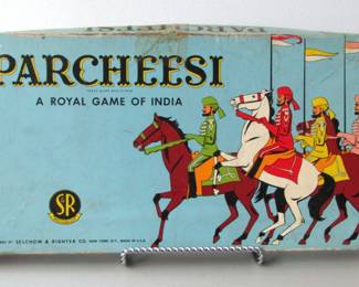 This parcheesi game was made 1938-1945 and features incredible graphics. American game makers, Selchow and Righter, trademarked the Parcheesi name in 1874 after purchasing the game rights in 1867. This set includes the original box, game board, dice, and game pieces for four players. There are two of the four original dice cups.