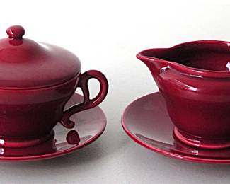 This gorgeous set of Franciscan includes a sugar bowl with lid and cream pitcher, along with matching saucers. It is in the El Patio design and maroon color. These were produced only from 1948 to 1950, so fairly rare. They are in excellent condition and don't look like they were even used!!