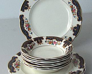 This 11-piece set of Unicorn China includes four salad plates and seven small bowls. They were produced by Thomas Hughes & Son in England, 1930-1935. The pattern is also known as "Unicorn Blue Panels." Beautiful condition.