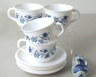 These four vintage cups and saucers were made by Arcopal France, known as "French Pyrex," and made from opal milk glass. These are in the Blue Onion pattern, also known as Aster. Comes with a cute little ceramic shoe made in Holland.