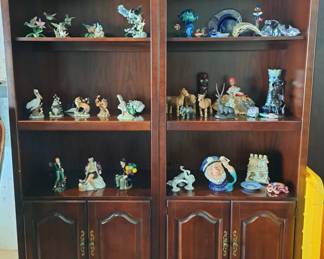 TWO BOOK CASES AND A VARIETY OF COLLECTIBLES