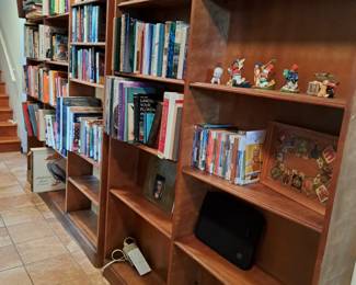 A VARIED BOOK SELECTION OF TOPICS AND SOME SMALL FIGURINES