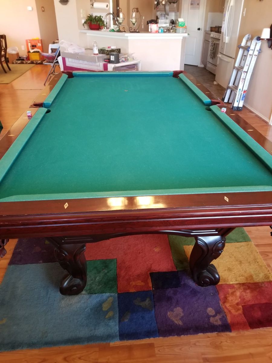 Brunswick 8 ft pool table with accessories. Felt replaced
