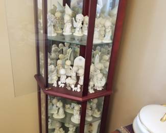 Curio cabinet full of Precious Moments